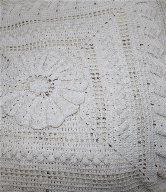 A crochet bed throw